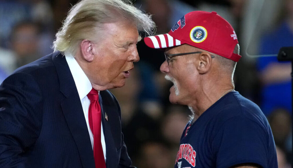 President Donald Trump greets a retired UAW autoworker while speaking at the General Motors Milford Proving Ground on July 27, 2026, in Milford, Mich. Andrew Harnik/Getty Images