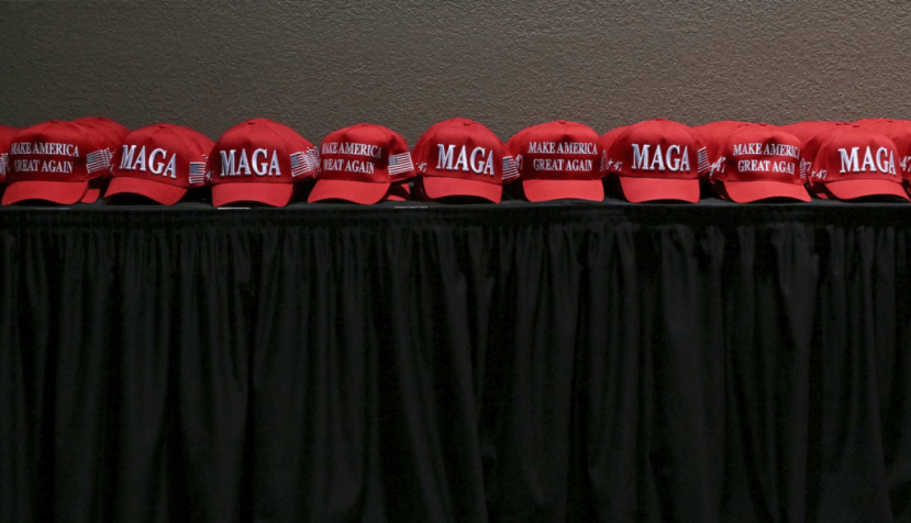 MAGA hats are placed on a table at an election night party in West Palm Beach, Fla., on Nov. 5, 2024. Ricky Carioti/The Washington Post via Getty Images