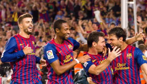 Jugadors del FC Barcelona celebren un gol de Leo Messi (tercer per l'esquerra) durant el partit de Supercopa que enfrontà l'equip català amb el Reial Madrid el 17 d'agost de 2011. Natursports/Shutterstock