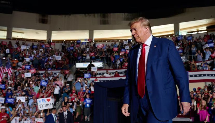 Former President Donald Trump makes his way to the stage during a rally in Erie, Pa., on July 29, 2023. Dustin Franz for The Washington Post via Getty Images