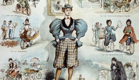 Viñeta de la ‘nueva mujer’ de pie en el centro, vistiendo pantalón con las manos en los bolsillos y mirada desafiante. Library of Congress