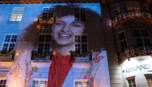 An image of 2023 Nobel Peace Prize winner Narges Mohammadi projected on a hotel in Norway before the Nobel Banquet in 2023. Javad Parsa/Pool/EPA