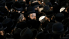 Rassemblement de Juifs orthodoxes sur la tombe du rabbin Shimon Bar Yochai, au mont Meron, dans le nord d’Israël, le 15 mai 2025. Dans un pays où la conscription est obligatoire pour tous les Juifs, y compris les femmes, l’exemption accordée à cette communauté qui représente désormais près de 15 % de la population est de plus plus remise en cause. Jalaa Marey/AFP