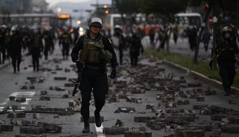Clashes on the streets of Peru. Ernesto Benavides/AFP via Getty Images)
