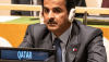  Un hombre sentado en una reunión con auriculares y el rótulo "Qatar" delante de él. Tamim bin Hamad Al Thani, actual emir de Catar, asiste a la 77.ª Asamblea General de las Naciones Unidas en la Sede de las Naciones Unidas el 20 de septiembre de 2022. lev radin/Shutterstock