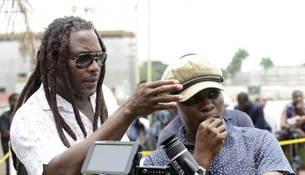 Filmmaker Biyi Bandele (left) directing the TV series Shuga in 2015. He was also a theatre maker and novelist. Pius Utomi Ekpei/AFP via Getty Images