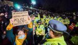 Protesters react to policing at a vigil for Sarah Everard. Vincenzo Lullo/Shutterstock