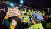 Protesters react to policing at a vigil for Sarah Everard. Vincenzo Lullo/Shutterstock