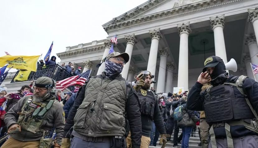 Members of the Oath Keepers stand in front of the U.S. Capitol on Jan. 6, 2021. AP Photo/Manuel Balce Ceneta