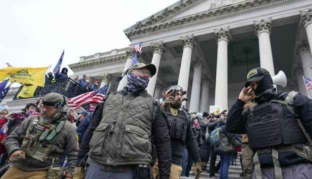 Members of the Oath Keepers stand in front of the U.S. Capitol on Jan. 6, 2021. AP Photo/Manuel Balce Ceneta