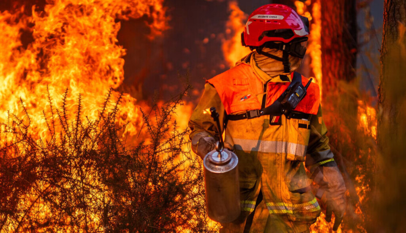 A firefighter works to contain a wildfire in Gironde, France, in late July. Mael Dubiez / EPA