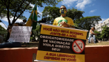 A protest in Brazil against mandatory COVID vaccinations and vaccine passports. Isaac Fontana / Shutterstock.com