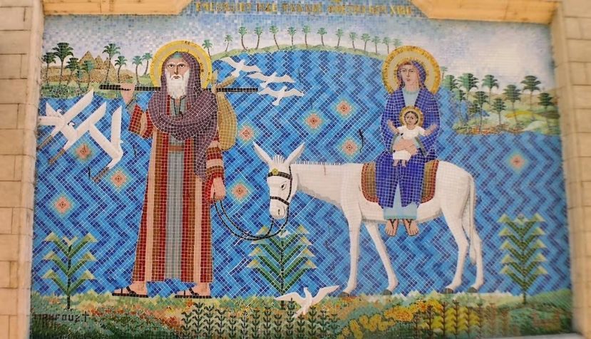 Hanging church courtyard tile mural showing holy family traveling. Daniel Mayer (Own work), via Wikimedia Commons, CC BY-NC-SA