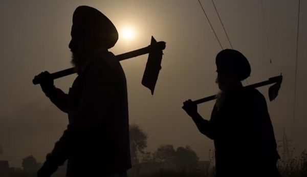 Farmers in India are among communities around the world hit hard by unscrupulous microlending. Narinder Nanu/AFP via Getty Images