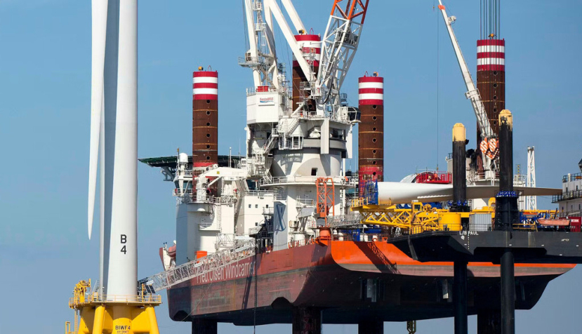 Wind farm construction means jobs and locally produced power. AP Photo/Michael Dwyer
