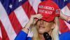 Republican US Representative Marjorie Taylor Greene dons her signed ‘make America great again’ hat. EPA/Erik S Lesser