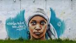 A UK mural employs the trending hashtag #BringBackOurGirls. Tim Green/Flickr, CC BY