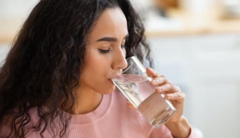 Water is important for your health, but it can’t boost weight loss. Prostock-studio/ Shutterstock