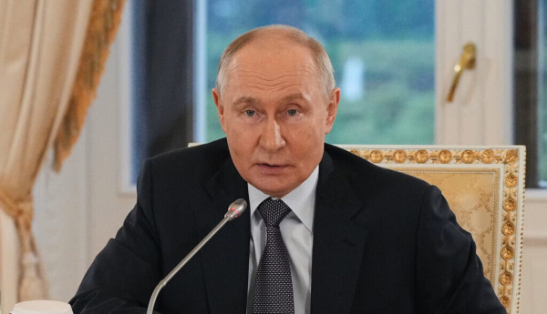 Vladimir Putin speaks during a press conference at the St. Petersburg International Economic Forum on June 4. Dmitri Lovetsky / EPA