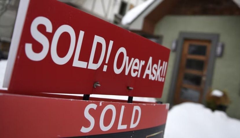 A for sale sign outside a home indicates that it has sold for over the asking price, in Ottawa, in March 2021. House prices and rents have become increasingly more unaffordable in Ontario over the past few years. THE CANADIAN PRESS/Justin Tang