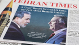 Iranian daily newspapers report on renewed talks between Iran and the United States. Atta Kenare/AFP via Getty Images