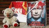 A sign reading ‘Putin, murderer’ is shown during a protest in Krakow, Poland, on May 8, 2022. Beata Zawrzel/NurPhoto via Getty Images