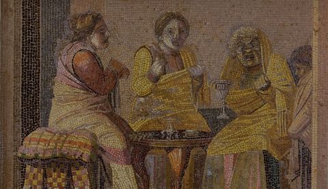 Escena teatral en la que dos mujeres solicitan la ayuda de una adivina. Mosaico de la villa del Cicerone, Pompeya. Museo Arqueológico Nacional de Nápoles. / Wikipedia