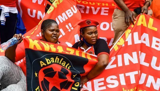 Members of shack-dwellers movement, Abahlali baseMjondolo protest the alleged theft of COVID-19 funds in Durban, South Africa. Photo by Darren Stewart/Gallo Images via Getty Images