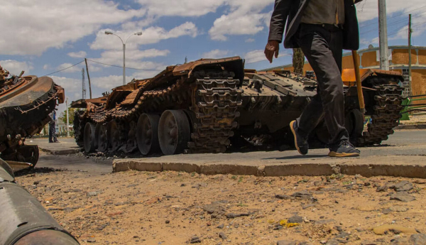A destroyed tank on the main street of Edaga Hamus, at the height of the war in Ethiopia’s Tigray region in 2021. Yan Boechat/VOA via Wikimedia Commons