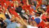 Atlanta Braves fans perform the ‘tomahawk chop’ during a playoff game in 2004. Streeter Lecka/Getty Images
