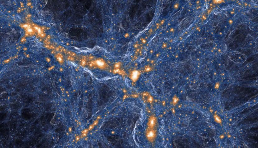 La telaraña cósmica. Visualización del gas cósmico (azul) alrededor de estructuras de materia oscura colapsadas (naranja/blanco). Los filamentos con las galaxias rodean grandes volúmenes de espacio, casi vacíos, de unos 100 millones de años luz de diámetro. © IllustrisTNG Collaboration, CC BY-NC-SA