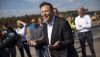 Tesla CEO Elon Musk, shown at an electric vehicle factory, called ESG ratings ‘a scam’ after an index dropped Tesla. Maja Hitij/Getty Images