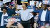Former President Barack Obama raises hands with Stacey Abrams and U.S. Sen. Raphael Warnock at a Oct. 28, 2022, campaign event in Georgia. Elijah Nouvelage/Getty Images