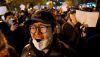 Protesters march along a street in Beijing on Nov. 28, 2022. Noel Celis/AFP via Getty Images