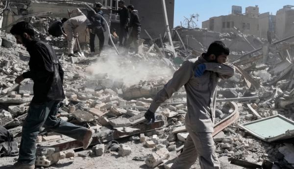 A group of men inspects the ruins of a police station in Tehran, Iran, on March 3, 2026. AP Photo/Vahid Salemi