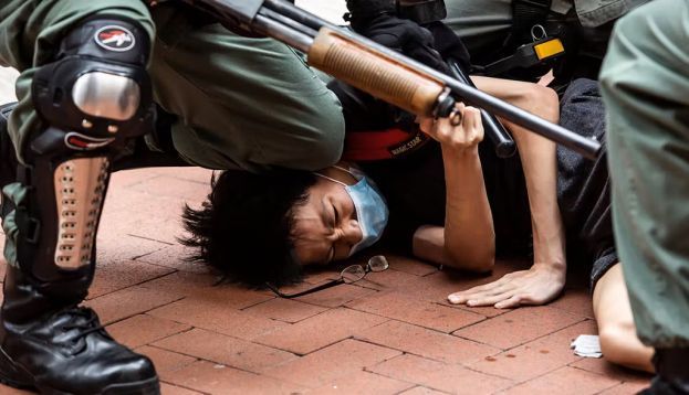 Pro-democracy protesters are arrested by police in Hong Kong on May 24, 2020. Isaac Lawrence/AFP via Getty Images