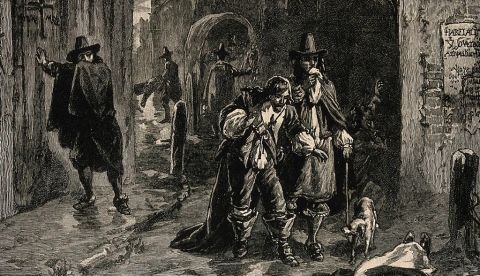Dos hombres descubren un cadáver en la calle durante la Gran Peste de Londres. 19th-century wood engraving. Herbert Railton/Wellcome Collection