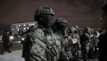 South Korean soldiers try to get into the National Assembly in Seoul on Dec. 3, 2024. Chung Sung-Jun/Getty Images
