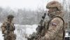 Russian army special forces inspect vehicles at a checkpoint in Zaporizhzhia, Ukraine, in February 2024. Sergey Nikonov/Shutterstock